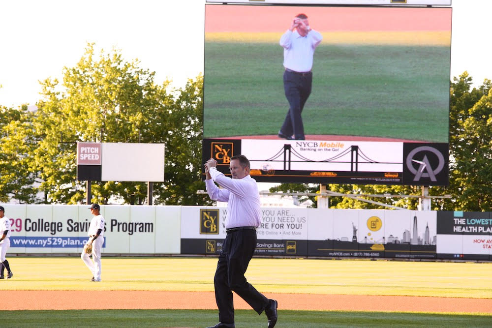 Pratt Industries COO David Dennis throws the first pitch of the Staten Island Yankees Game